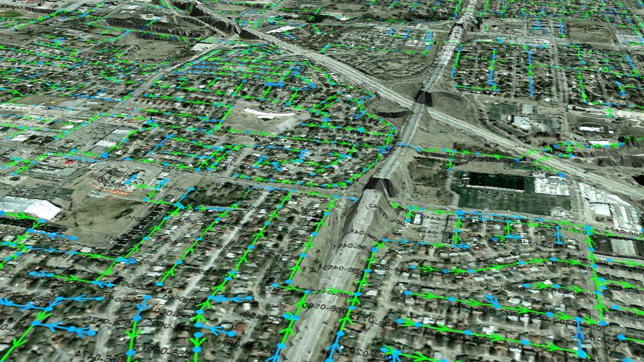 A 3D, aerial view of a real-time control water system below a city